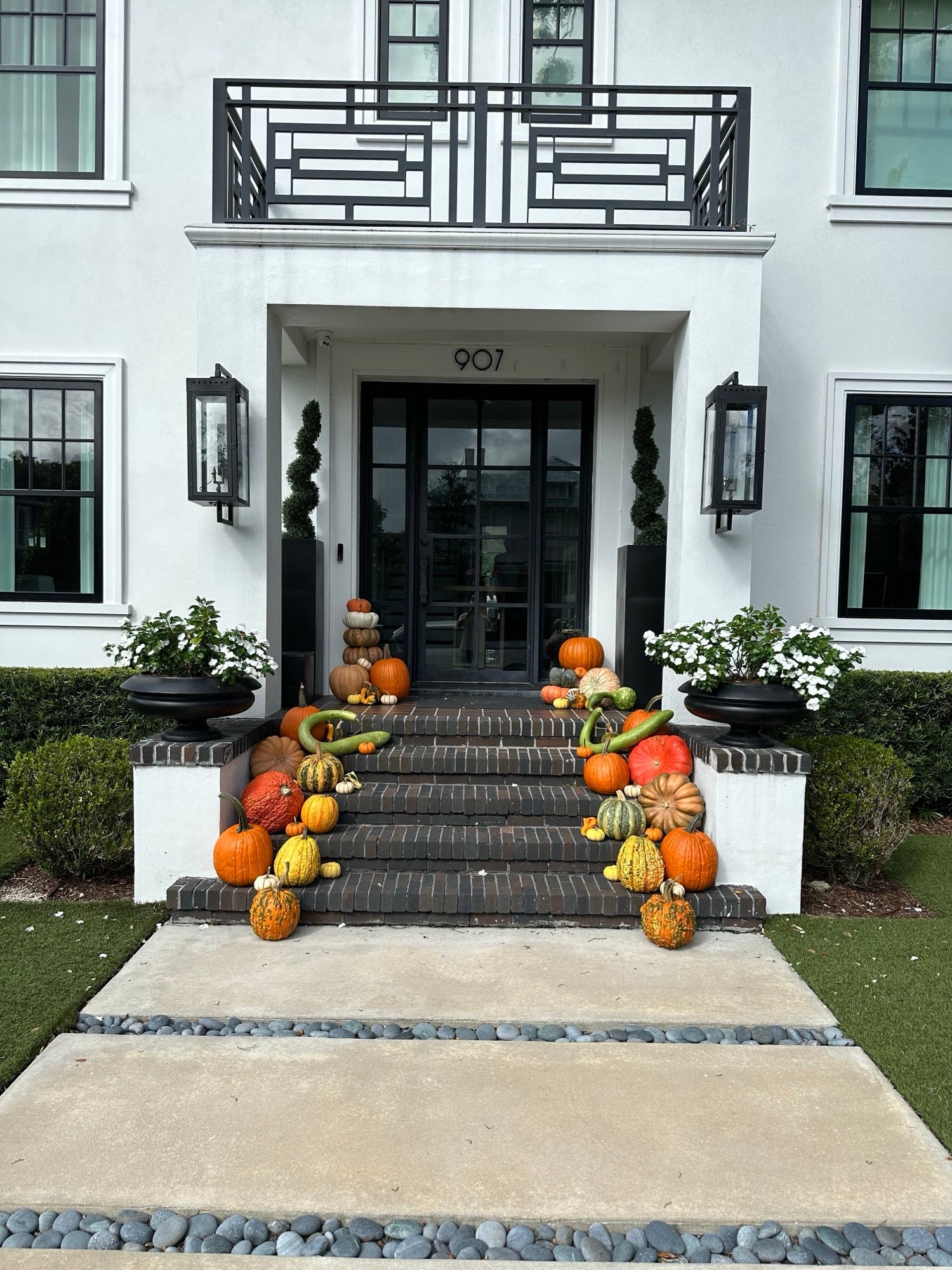 The Grand pumpkin porch install photo