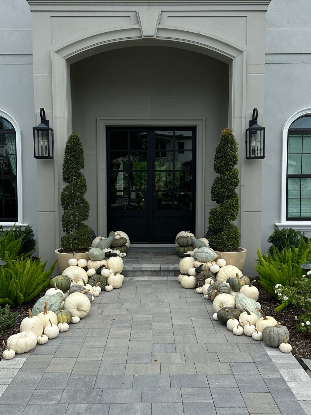 The Estate pumpkin porch install photo